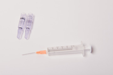 Obraz premium Medical ampules for injections on a white background.