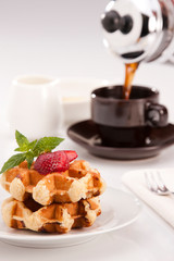 Waffle with berries and coffee