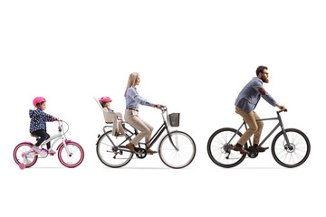 Father, mother and two girls riding a bicycle with a child