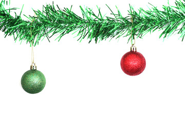 close up of christmas ball and pine tree on white