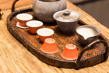 Asian tea set a wooden table