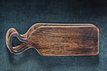 wooden vintage serving cutting boards on black background