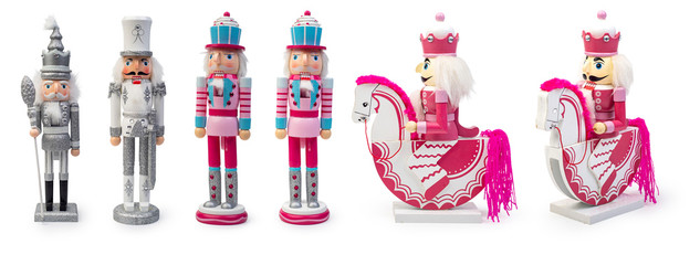 Traditional Figurine Christmas Nutcracker Wearing An Old Military Style Uniform on a horse isolated...