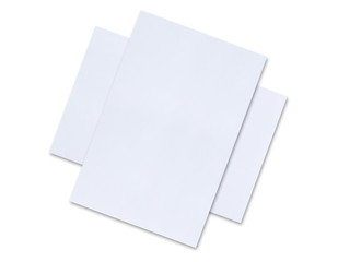 close up of stack of papers on white background