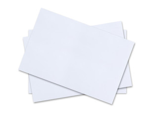 close up of stack of papers on white background