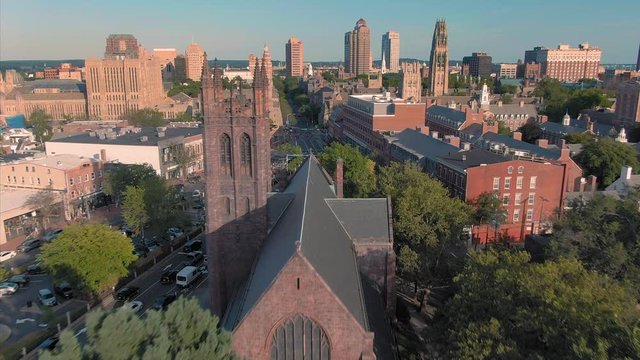 Aerial: Establishing shot of broadway street & church near Yale University t. New Haven, Connecticut, US