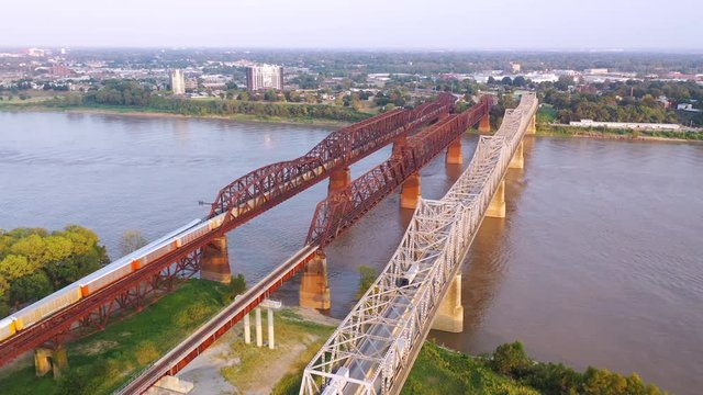 Aerial of landmark three steel bridges over the Mississippi River with Memphis, Tennessee background.
