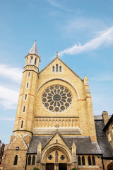 Fototapeta na wymiar Exterior of St Aloysius Catholic Church with blue sky in Oxford town