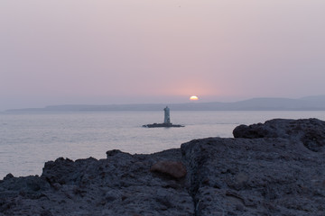 Leuchtturm bei Sonnenuntergang Sant Antioco Sardinien