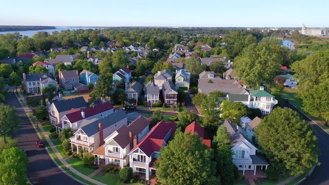 Aerial over generic upscale neighborhood with houses and duplexes in a suburban region of Memphis Tennessee, Mud Island.