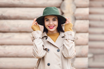 Beautiful young woman outdoors on autumn day