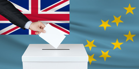 Election in Tuvalu. The hand of man putting his vote in the ballot box. Waved Tuvalu flag on...