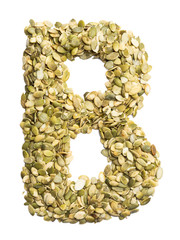 Letter B of the English alphabet from pumpkin seeds on a white isolated background. Food pattern made from seeds. Bright alphabet for shops.