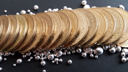 metal Turkish lira and silver grains