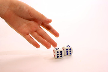 palm, dice, Selective focus.  The bone is blurred due to movement.  Throw dice