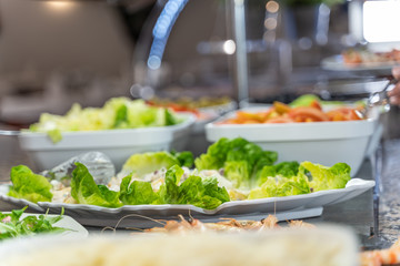 Salad plate at a self-service restaurant counter