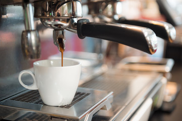 black coffee morning on coffee machine