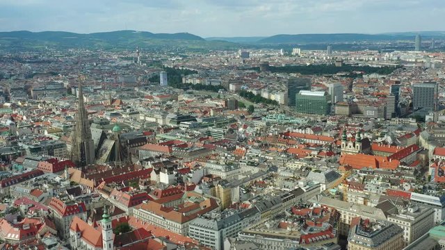 day time flight over vienna city center famous cathedral aerial panorama 4k austria