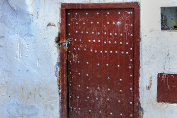 Typical ancient wooden door in Tetouan Medina in Northern Morocco.