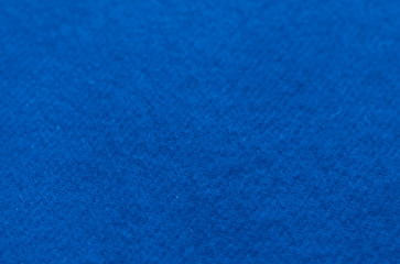 The trend color of the year 2020 Classic Blue. Woolen background, texture, close-up