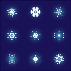 Collection of simple snowflakes on blue background.