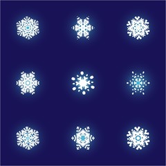Set of christmas paper snowflakes on blue background.