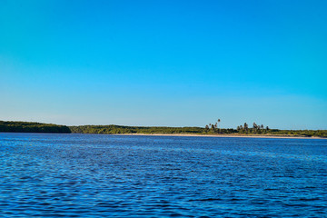sea ​​and blue sky kills green