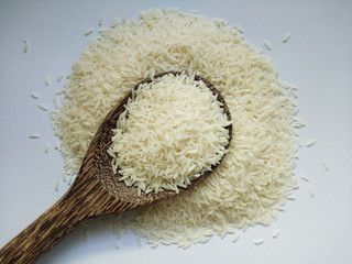 Jasmine rice on white background , close up
