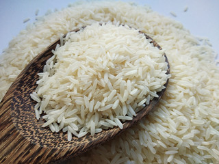 Jasmine rice on white background , close up