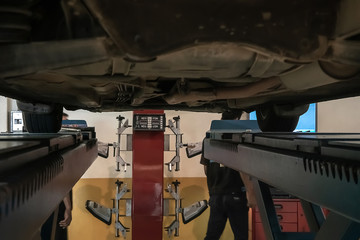 Bangkok/Thailand - December 08 2019 : The sedan is inspected for vehicle condition in the garage