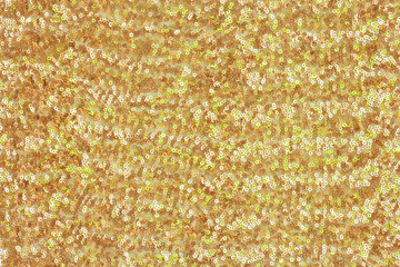 Abstract festive background with round sequins with color transition. Texture fabric embroidered...