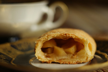 Homemade organic apple roll. Delicious dessert on a vintage plate