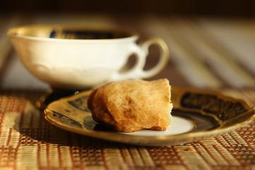 Homemade organic apple roll. Delicious dessert on a vintage plate