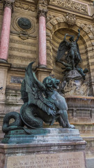 Naklejka premium Monumento de san Miguel derrotando al demonio
