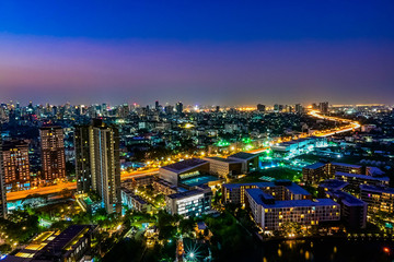 Cityscape of building at night scene in Thailand