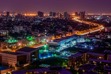Fototapeta na wymiar Cityscape of building at night scene in Thailand