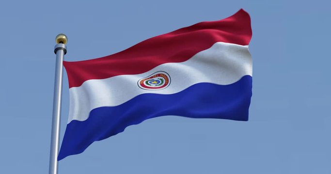 flag of Paraguay waving in the wind in front of blue sky