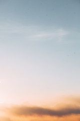 Uniform background for the screensaver. Blue gentle clouds at dawn.