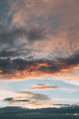 Uniform background for the screensaver. Pink and blue gentle clouds at sunset.
