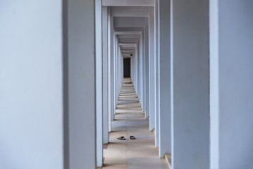 Long white corridor in the Temple.Thailand.