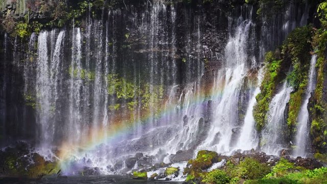 Shiraito waterfall with rainbow in Autumn, Japan (Slow motion)