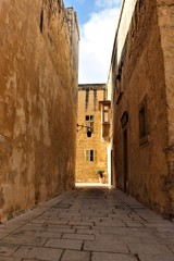 Ancient narrow street in Mdina, Malta.