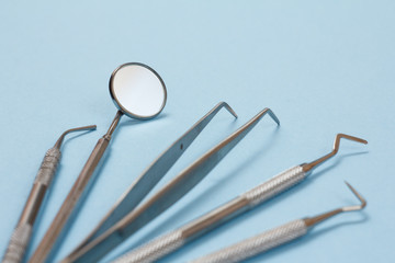 Set of metal dental instruments for teeth dental care