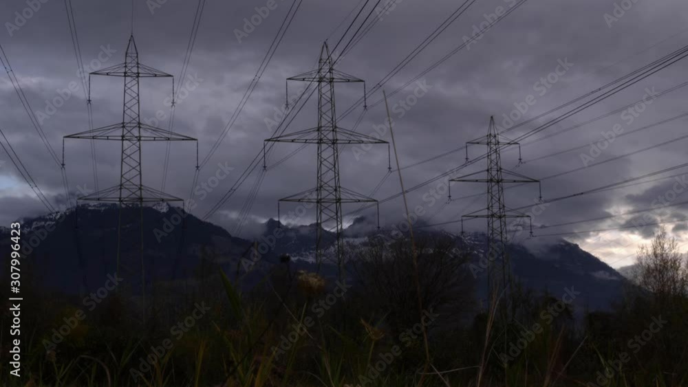 Canvas Prints time-lapse over three high voltage power lines in the mountains.
