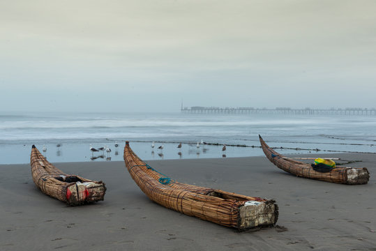 Typical fishing boat "Caballitos de totora" on the beach of Pimentel, Chiclayo, Peru 