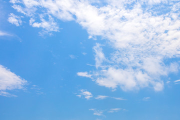 Blue sky and soft white clouds at day time for background.
