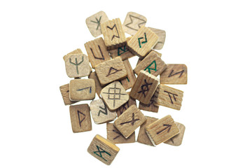 Old wooden runes isolated on a white background