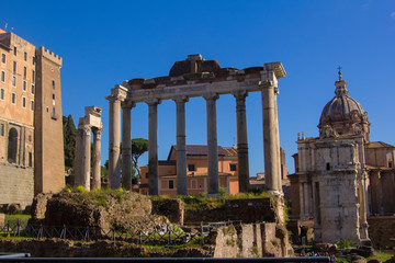 Fototapeta na wymiar background view of antique ruins in the Roman Forum on Capitol Hill, Rome, Europe