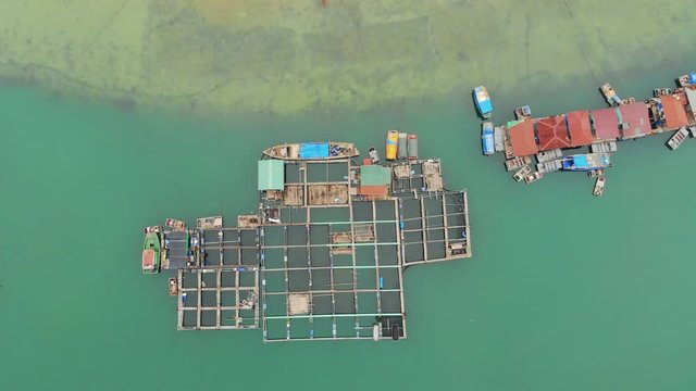 The traditional Cua Van Floating Village in Halong Bay, Vietnam