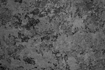 Texture of a concrete wall with cracks and scratches which can be used as a background
